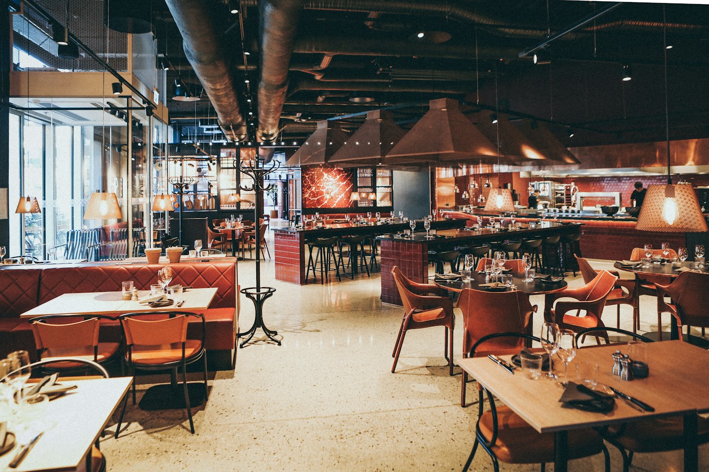 Restaurant floor opening onto a working kitchen